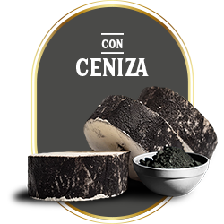 Medallones de queso de cabra Le Blanc con cobertura de ceniza vegetal presentados con un cuenco de ceniza fina.